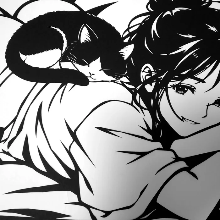 猫と女性の作品の細部