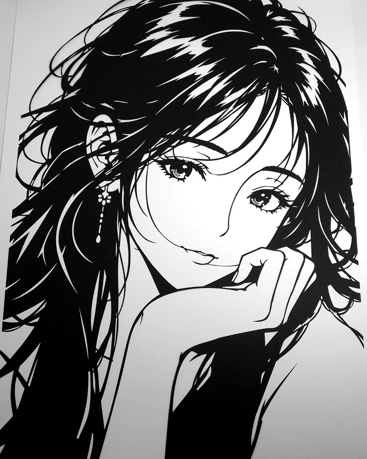 頬に手を添える女性の切り絵